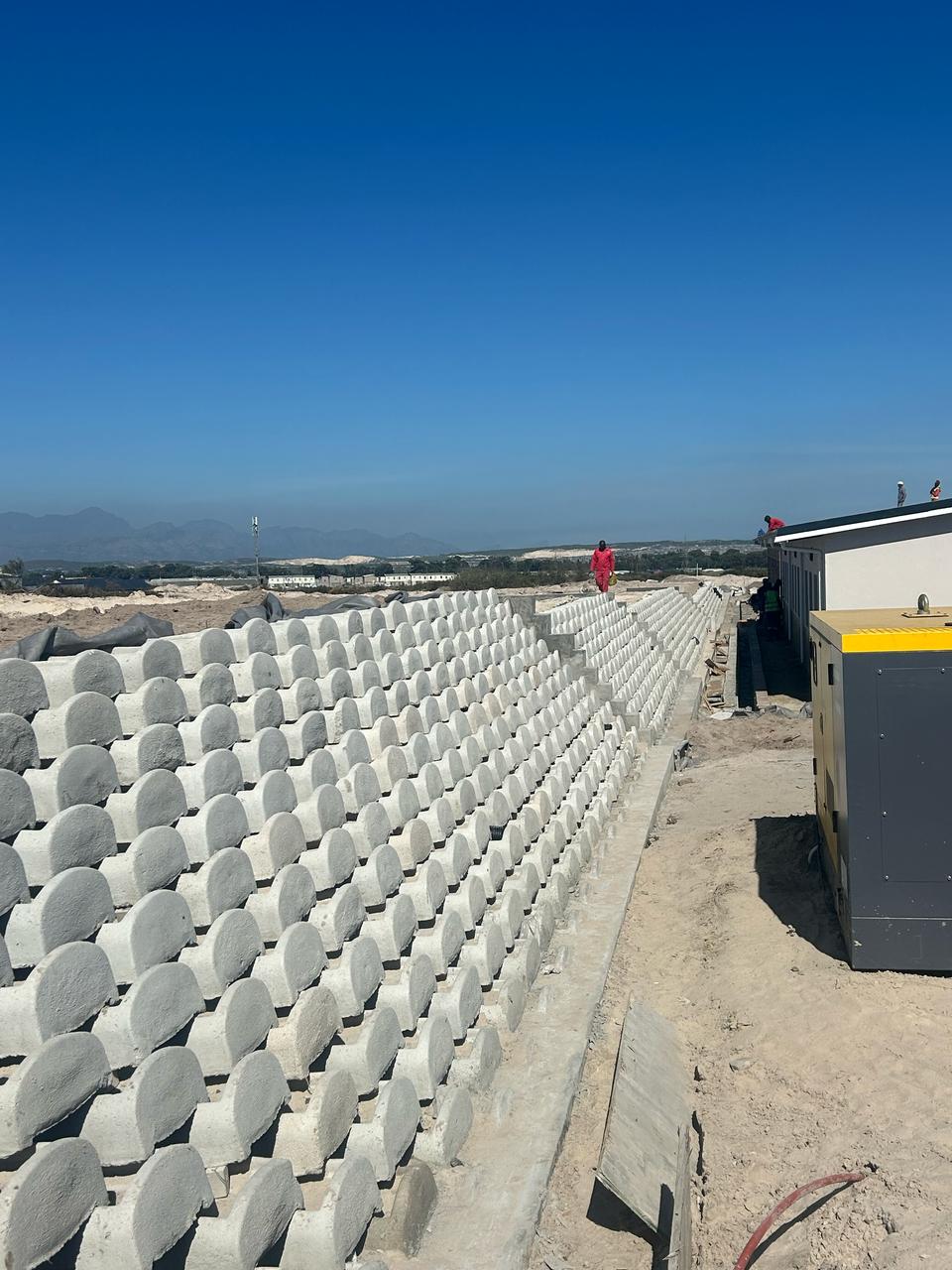 Target Plant Hire & Civils - Completed Retaining Wall Project, Workers and Prefab on Site - Construction Service